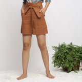 Front View of a Model wearing Almond Brown Handspun Paperbag Shorts