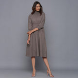 Front View of a Model wearing Ash Grey Flannel High Neck Midi Dress