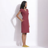 Right View of a Model wearing Barn Red Warm Cotton Waffle Knee Length Paneled Dress