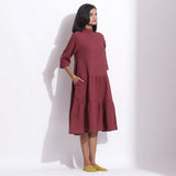 Right View of a Model wearing Barn Red Warm Cotton Waffle High Neck Midi Dress