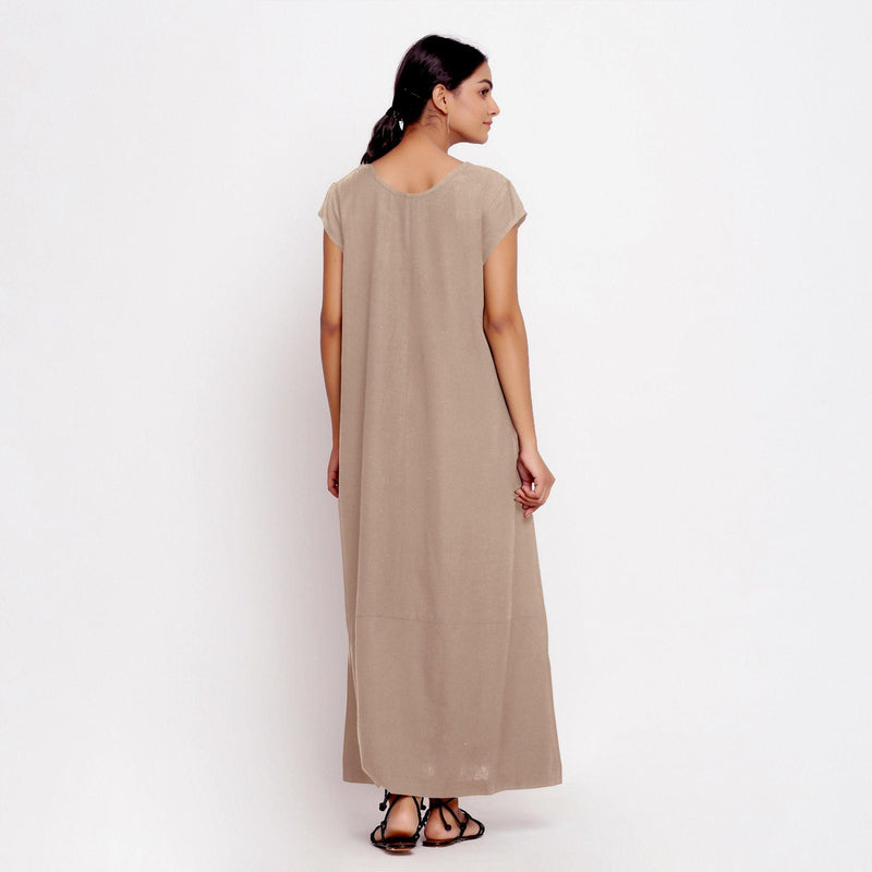 Back View of a Model wearing Beige Cotton Flax A-Line Paneled Dress
