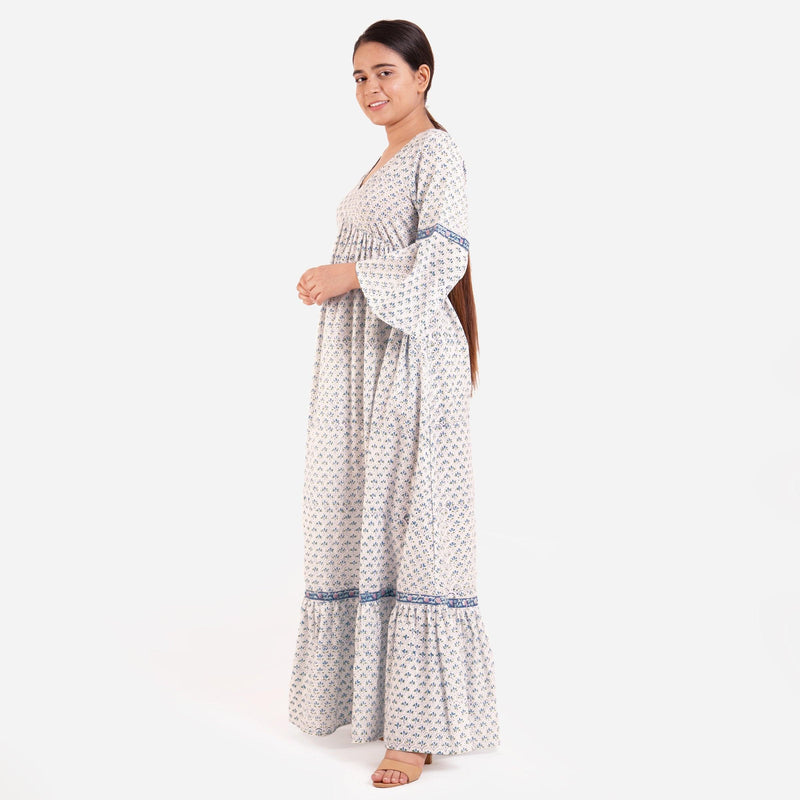 Left View of a Model wearing Blue Block Printed Floor Length Bohemian Cotton Dress