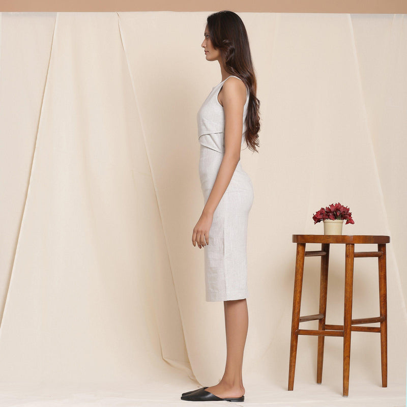 Left View of a Model wearing Cloudy Grey Knee Length Sheath Dress