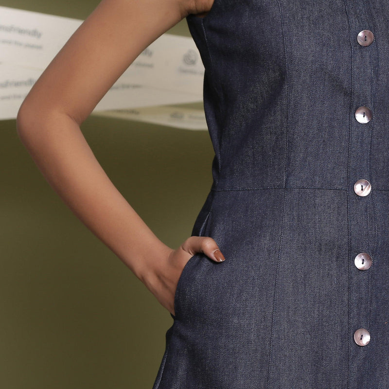 Front Detail of a Model wearing Cotton Denim Button-Down Shirt Dress