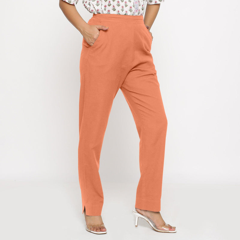 Right View of a Model wearing Cotton Flax Mid-Rise Peach Tapered Pant