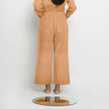 Back View of a Model wearing Desert Yellow Linen Patch Pocket Wide Legged Pant