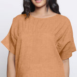 Front Detail of a Model wearing Desert Yellow Round Neck Linen Yoked Top