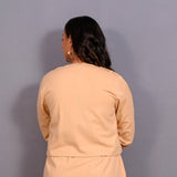 Back View of a Model wearing Dusk Beige Warm Cotton Flannel Double-Breasted Button-Down Shacket
