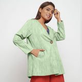 Right View of a Model wearing Green 100% Cotton Flared Short Jacket