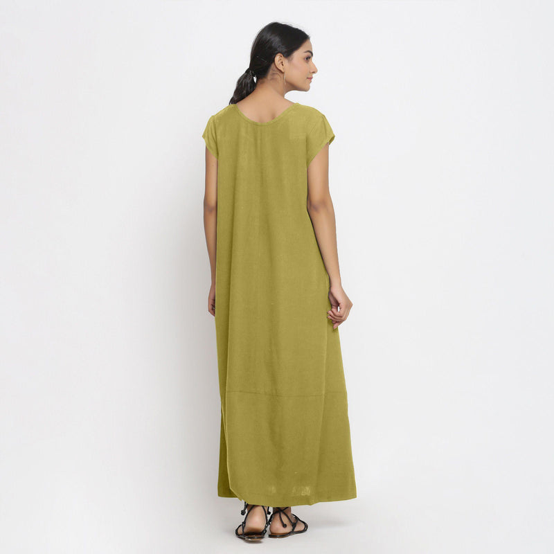 Back View of a Model wearing Green Cotton Flax A-Line Paneled Dress