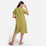 Back View of a Model wearing Green Cotton Flax Anti-Fit Dress
