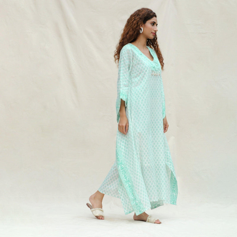 Right View of a Model wearing Green Floral Block Printed Cotton Maxi Kaftan Dress