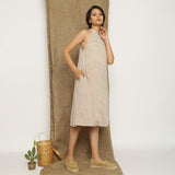 Right View of a Model wearing Handspun Cotton Lace Paneled Dress