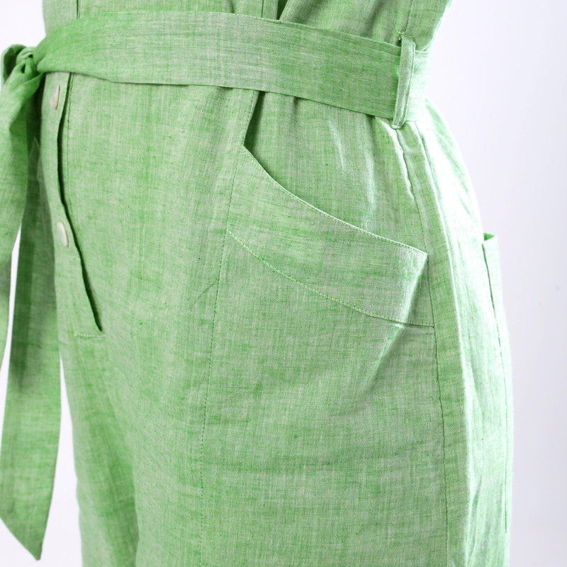 Left Detail of a Model wearing Handspun Mint Green Paneled Button-Down Jumpsuit