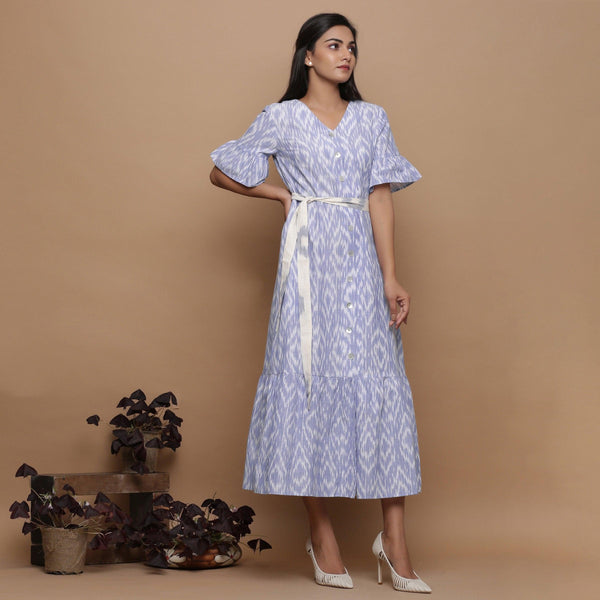 Right View of a Model wearing Blue Handwoven Cotton Button-Down Dress