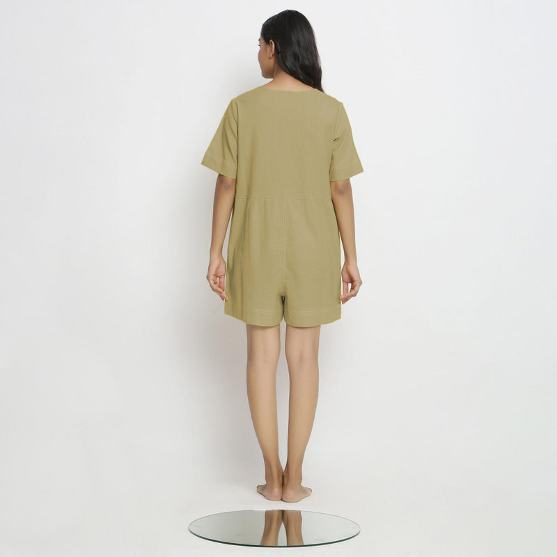 Back View of a Model wearing Khaki Green Vegetable Dyed Romper