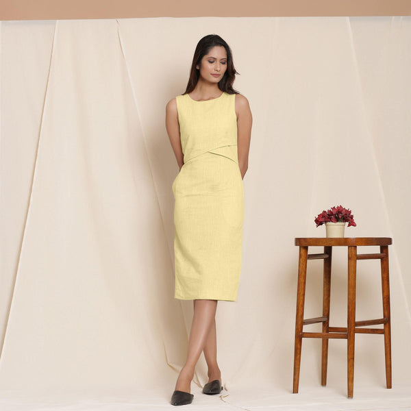 Front View of a Model wearing Lemon Yellow Knee Length Cotton Sheath Dress