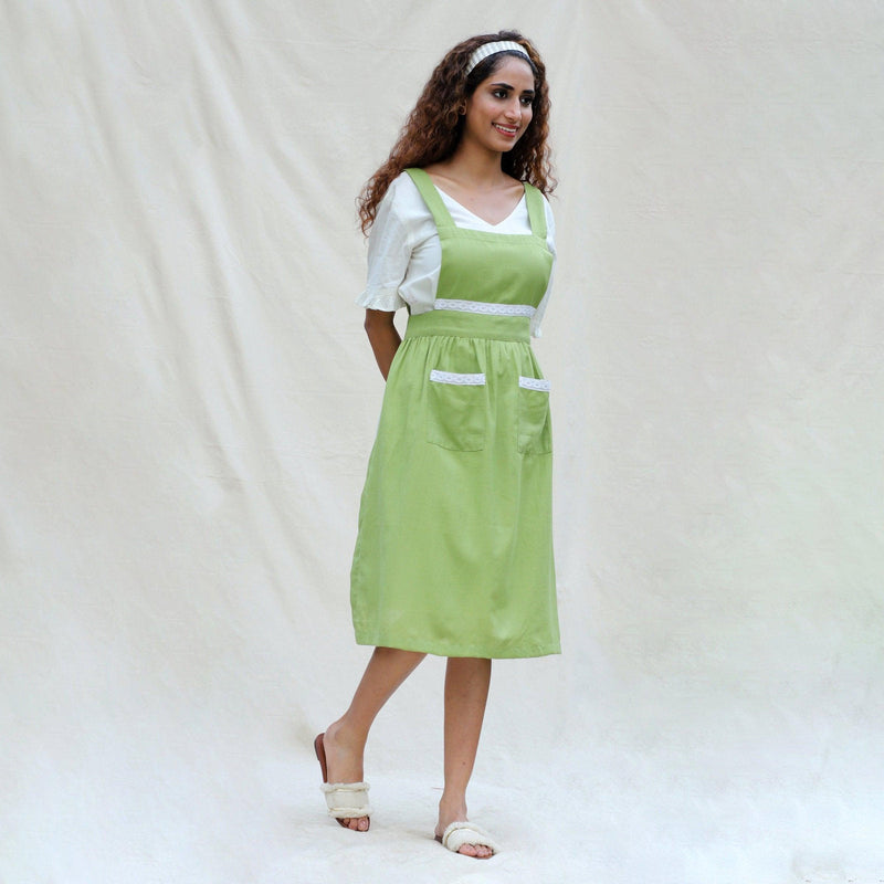 Right View of a Model wearing Light Green Cotton Flax Comfort Fit Apron