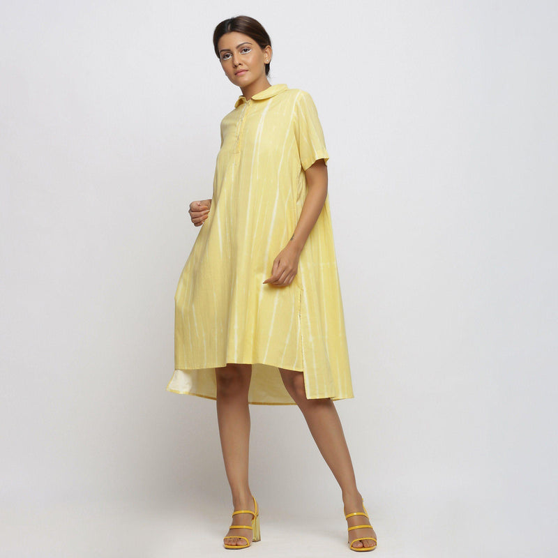 Left View of a Model wearing Light Yellow Tie And Dye High Low Dress