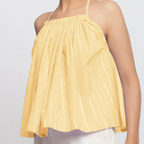 Front Detail View of a Model wearing Light Yellow Tie Dye Strappy Camisole Top