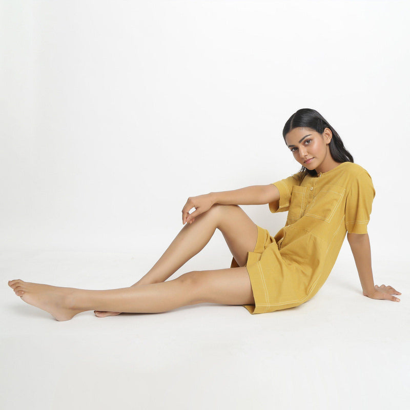 Left View of a Model wearing Light Yellow Vegetable Dyed Romper