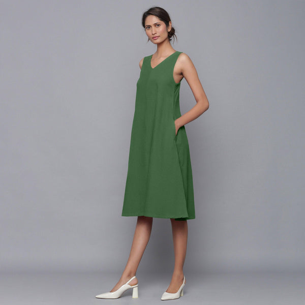 Left View of a Model wearing Moss Green Corduroy Flared Dress