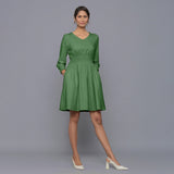 Front View of a Model wearing Moss Green V-Neck Corduroy Dress
