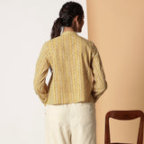 Back View of a Model wearing Mustard Striped Bagru Block Print Yoked Shirt