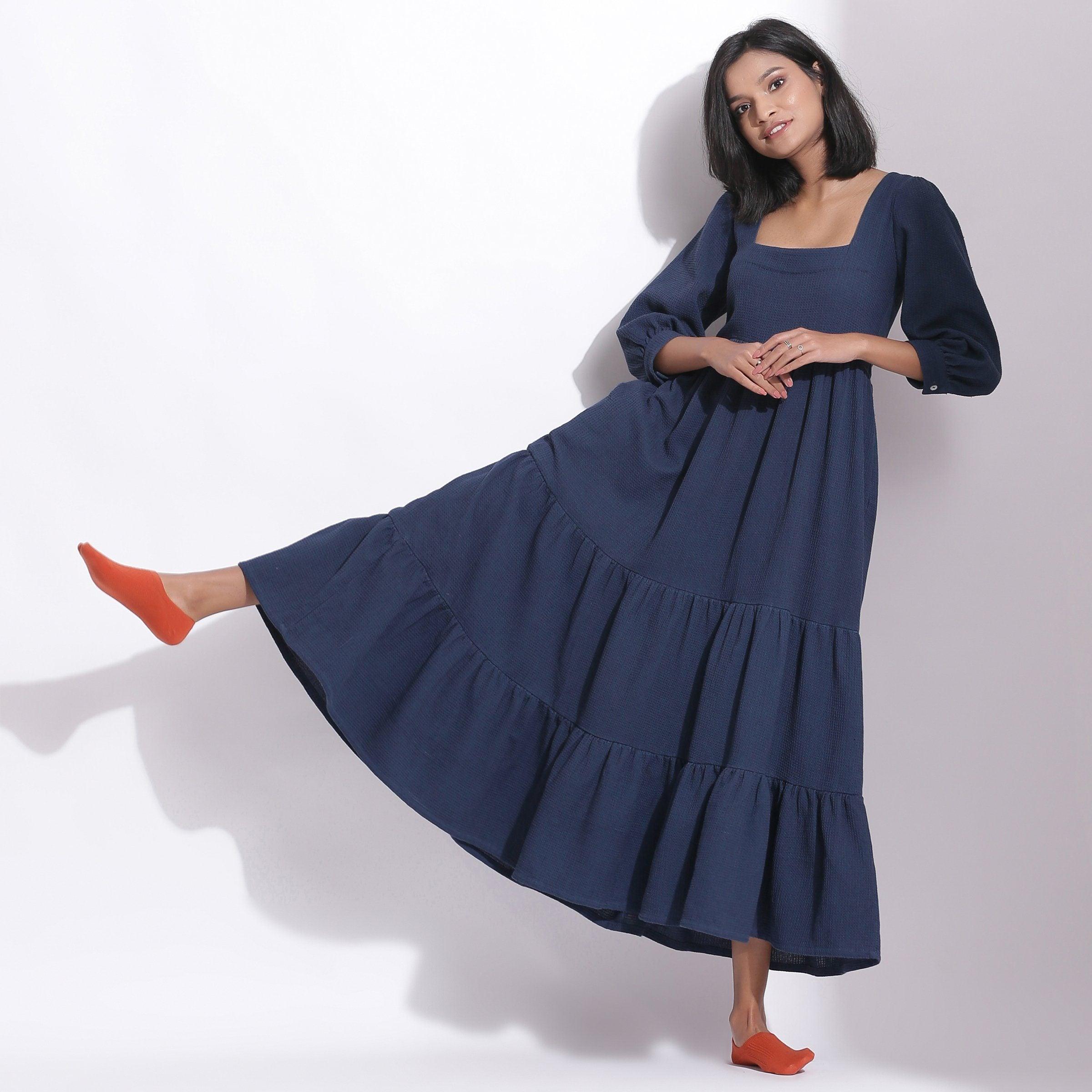http://seamsfriendly.com/cdn/shop/products/navy-blue-cotton-waffle-tier-maxi-dress-tier-dress-261018.jpg?v=1692633960