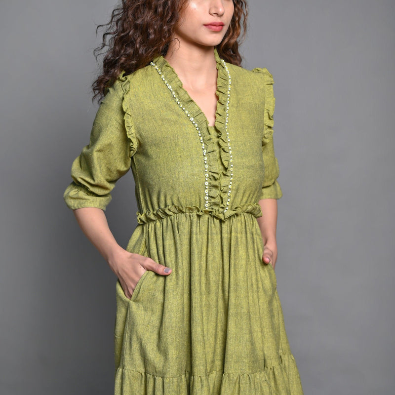 Front Detail of a Model wearing Olive Green Hand Beaded Handspun Cotton Maxi Boho Dress