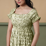 Front Detail of a Model wearing Olive Green Shibori Elasticated Gathered Dress