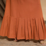 Close View of a Model wearing Orange Floor Length Pleated Tier Dress