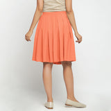 Back View of a Model wearing Peach Cotton Flax Pleated Skirt