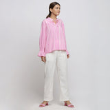Right View of a Model wearing Pink Tie-Dye 100% Cotton Shirred Blouson Top