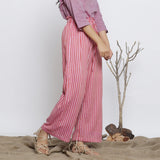Right View of a Model wearing Pink Handspun Striped Paperbag Pant