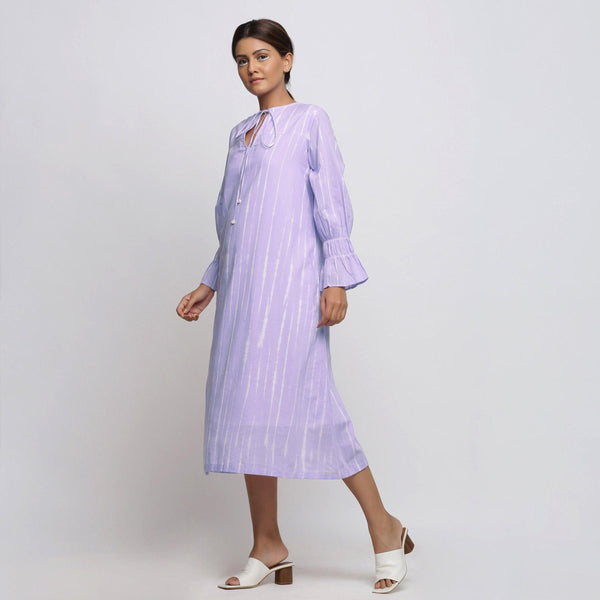Left View of a Model wearing Poet Sleeves Cotton Lavender Yoke Dress