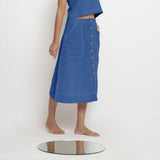 Right View of a Model wearing Powder Blue Vegetable Dyed Button-Down Skirt