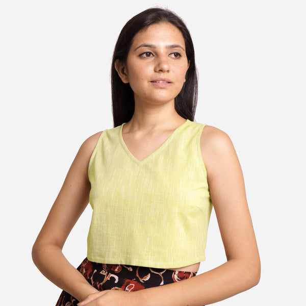 Front View of a Model wearing Solid Lemon Yellow Yarn Dyed Cotton Crop Top