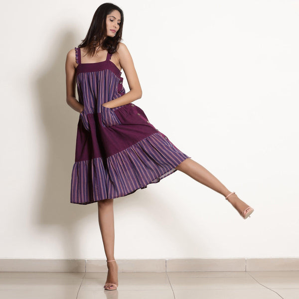Front View of a Model wearing Berry Wine Striped Cotton Knee Length Tier Dress