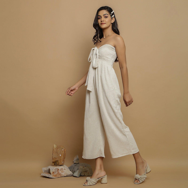 Left View of a Model wearing Undyed Cotton Flax Straight Jumpsuit