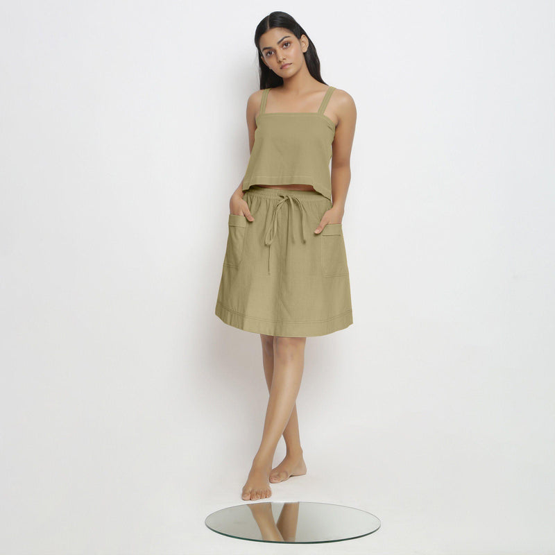 Front View of a Model wearing Vegetable-Dyed Green 100% Cotton Mid-Rise Skirt
