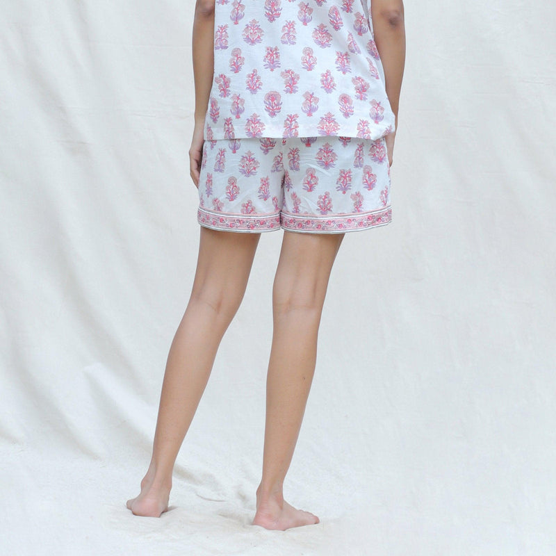 Back View of a Model wearing White and Fuchsia Block Printed Cotton High-Rise Elasticated Shorts