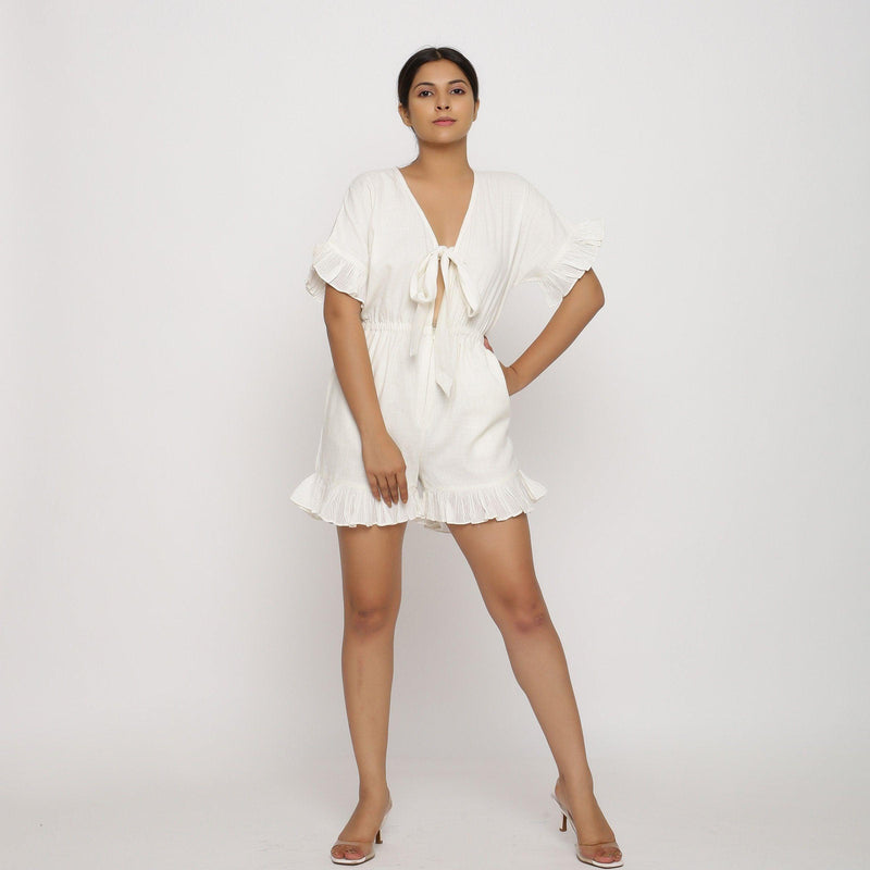 Front View of a Model wearing White Frilled Sleeve Cotton Playsuit