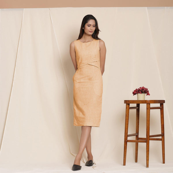 Front View of a Model wearing Yellow Knee Length Cotton Sheath Dress