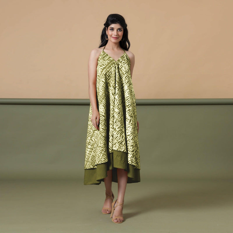 Front View of a Model wearing Convertible Olive Green Shibori Tie Dye 6-Way Skirt Dress