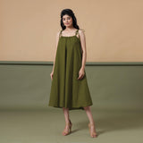 Front View of a Model wearing Convertible Olive Green Shibori Tie Dye 6-Way Skirt Dress