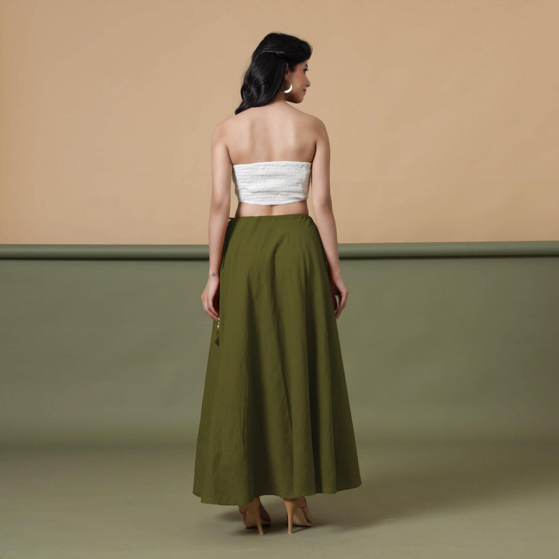 Back View of a Model wearing Convertible Olive Green Shibori Tie Dye 6-Way Skirt Dress