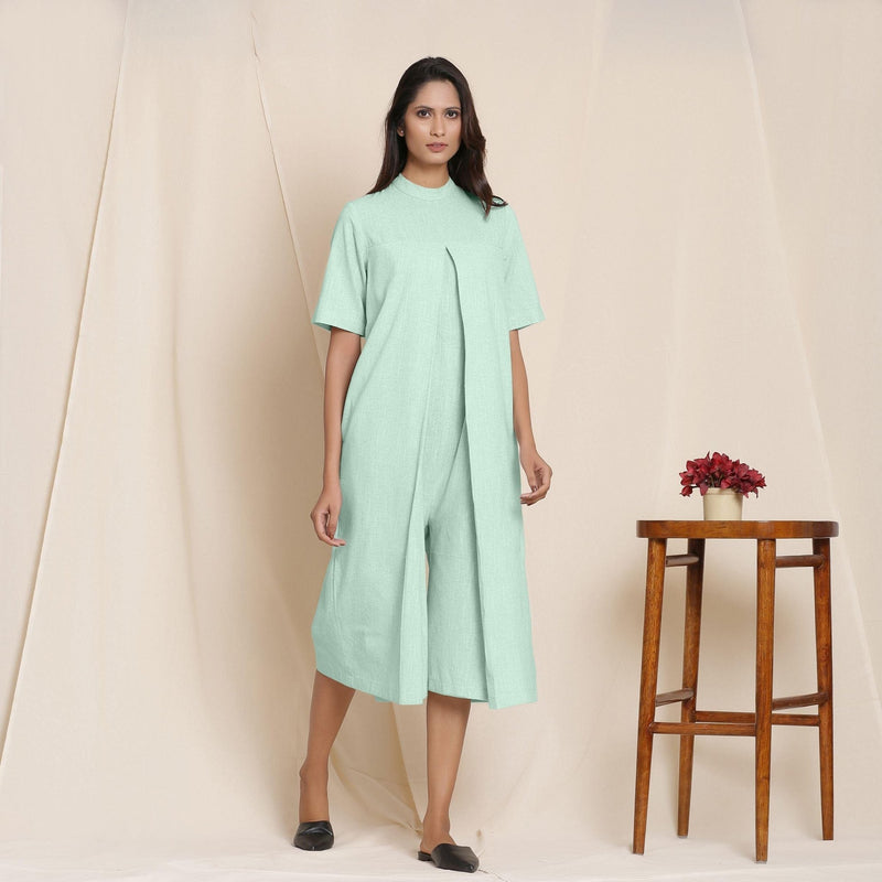 Front View of a Model wearing Cotton Aqua Box Pleated Jumpsuit