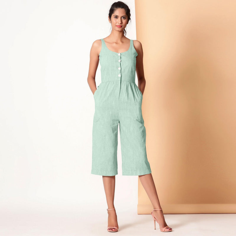 Front View of a Model wearing Aqua Sleeveless Cotton Button-Down Midi Jumpsuit