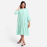 Front View of a Model wearing Aqua Yarn-Dyed 100% Cotton Tier Dress